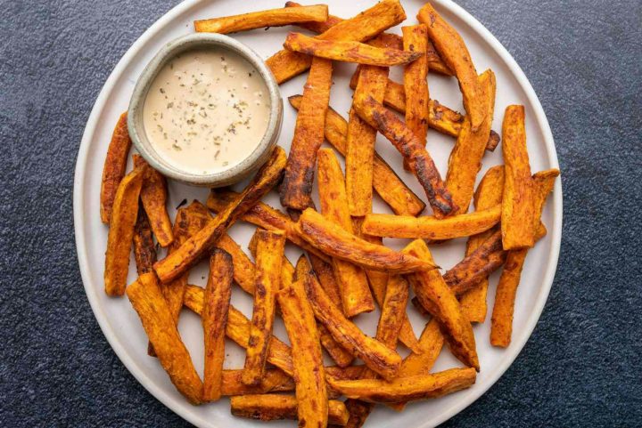 Sweet potato fries with a side of dipping sauce