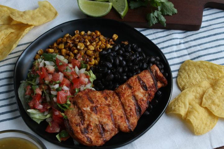 Burrito bowl with chicken, black beans, corn and pico de gallo salsa