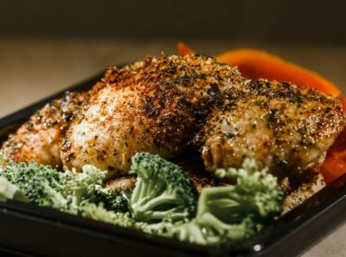 Herb roasted chicken meal with broccoli and bell pepper