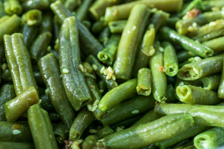 Cooked green beans displayed close-up