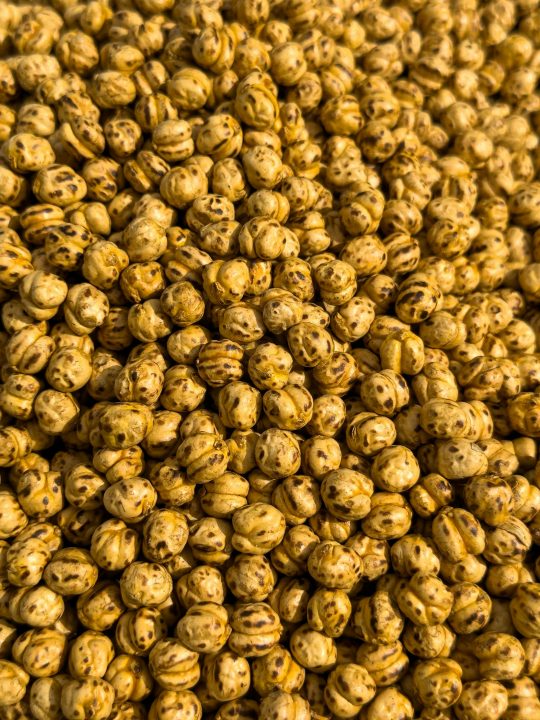 Golden heap of crunchy roasted chickpeas as a snack