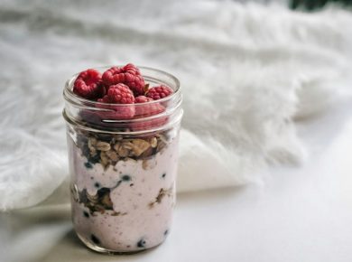 Yogurt parfait with granola layered in a mason jar, an easy high-protein breakfast without eggs