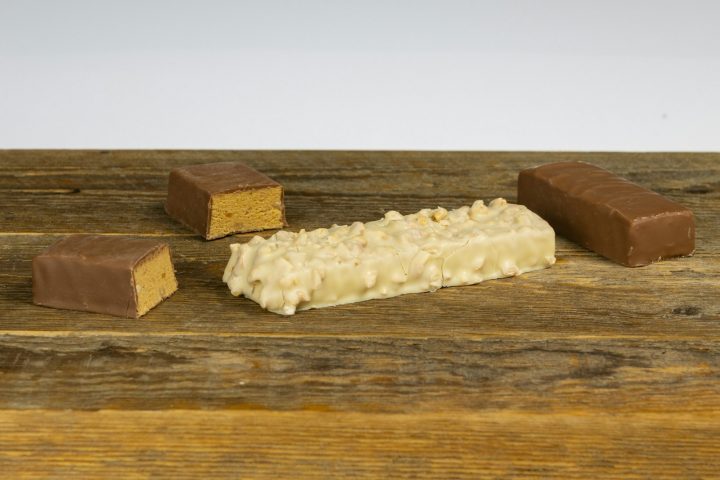 High protein snack bars close-up on a wooden table