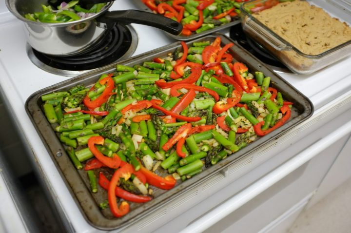 Bell peppers, asparagus and other vegetables on a silver tray