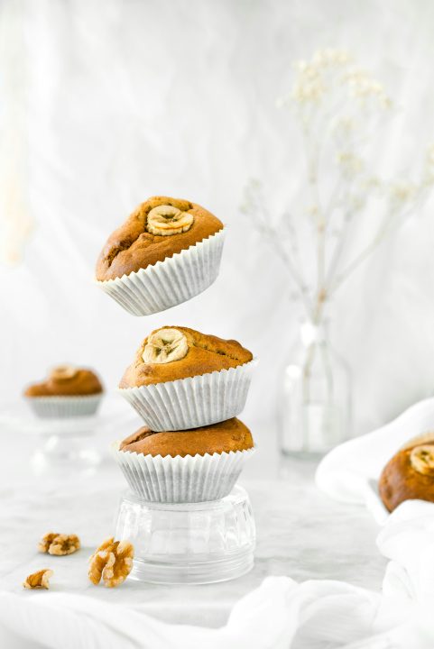 A stack of three muffins sitting on top of each other