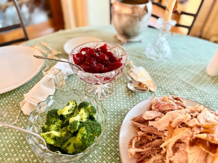 Thanksgiving dinner with turkey, cranberry sauce and broccoli