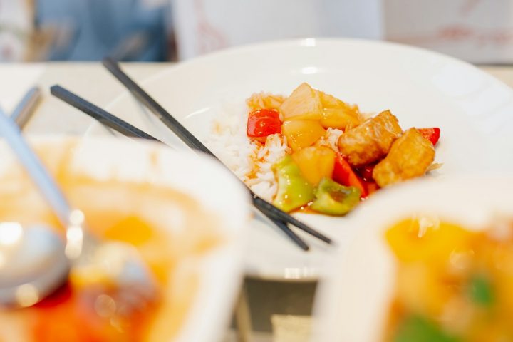 Pan-cooked tofu with vegetables on a plate, a plant-based protein alternative to eggs